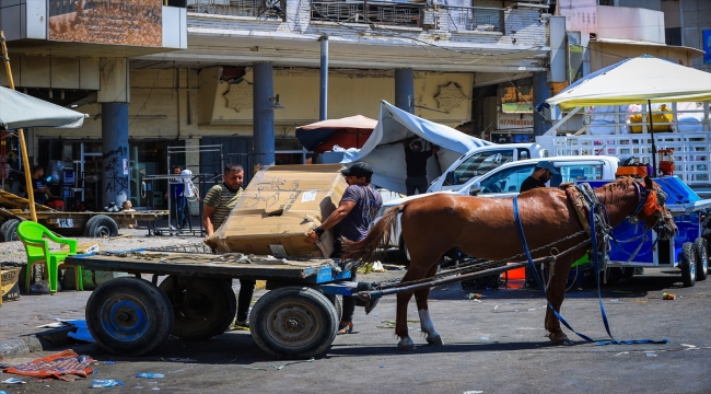 Irak'ta yevmiyeli işçiler eve ekmek götürmek için 50 derece sıcaklığa katlanıyor