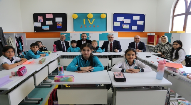 TMV'nin Gürcistan Uluslararası Maarif Okullarının yeni binası törenle açıldı